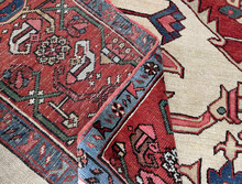Close-up of antique Persian Serapi carpet showing wool, pile and weave