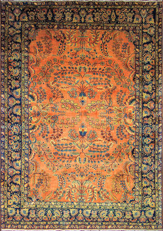 An Antique Sarouk Mohajiran Carpet