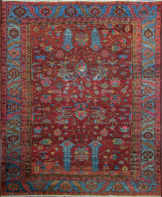 An Antique Heriz Carpet